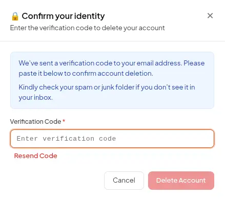 Confirm your identity modal showing the blue notice about the emailed verification code and an empty Verification Code field